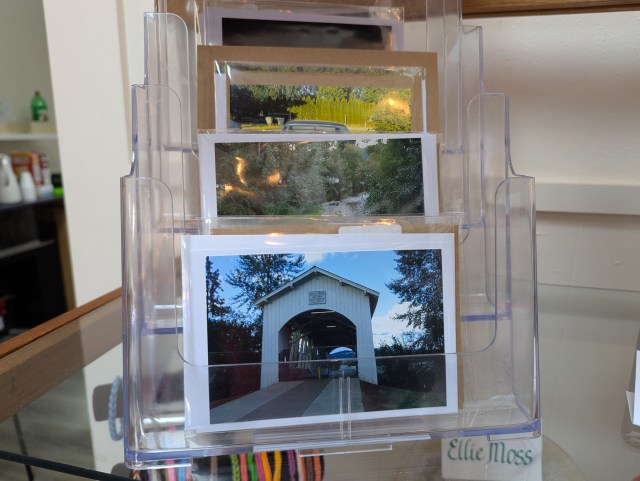 Photo cards in a plastic display
